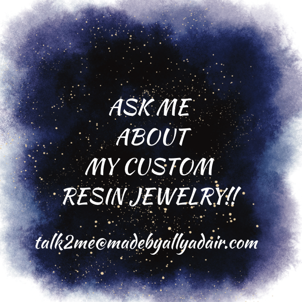 Starry navy promotional sign reading Ask me about my custom resin jewelry with contact email and double-sided resin pendant