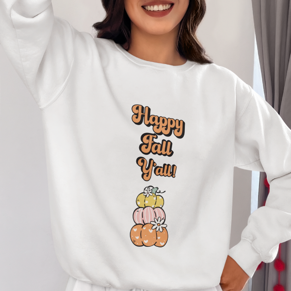 Happy Fall Y’all sweatshirt on model white pullover with stacked pastel pumpkins and retro orange lettering